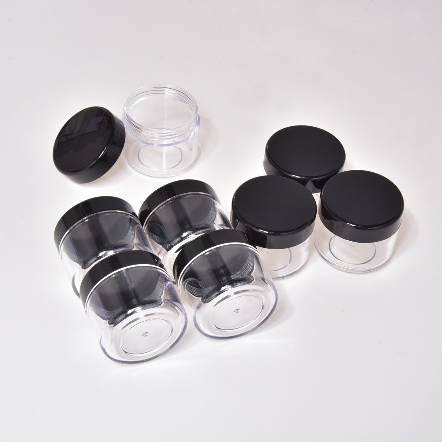 20 Pieces round Pot Jars Plastic Cosmetic Containers Set with Lid for Liquid Creams Sample, 20 Ml/ 0.7 Oz (Black Lid)